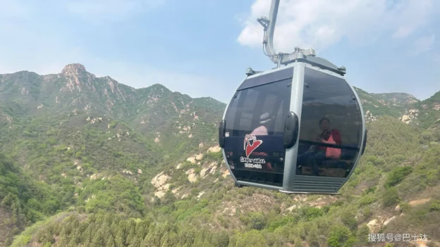 Badaling Great Wall cable car cabin above mountain ridges