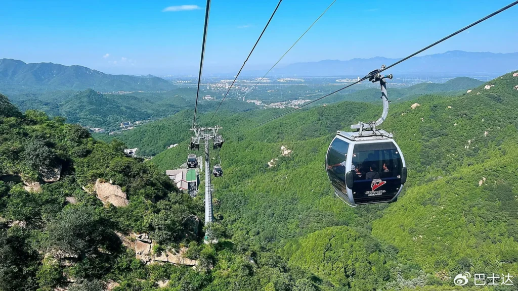 Badaling Great Wall cable car above a green valley