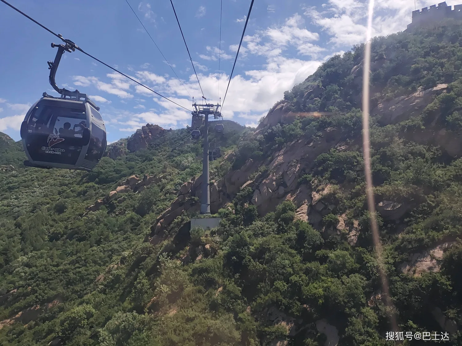 Badaling Great Wall cable car crossing a shaded valley