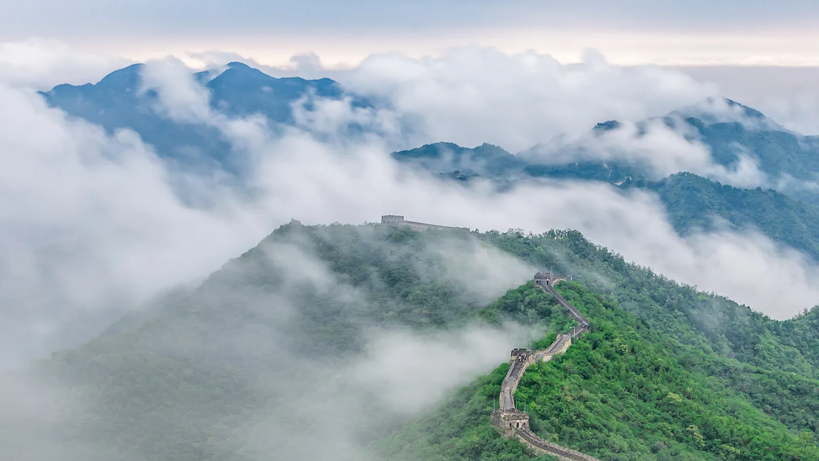 Great Wall ridges disappearing into low clouds