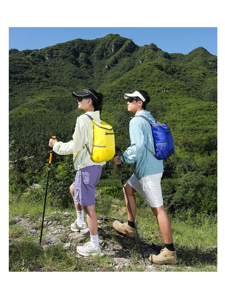 Hikers with backpacks on a Great Wall mountain trail