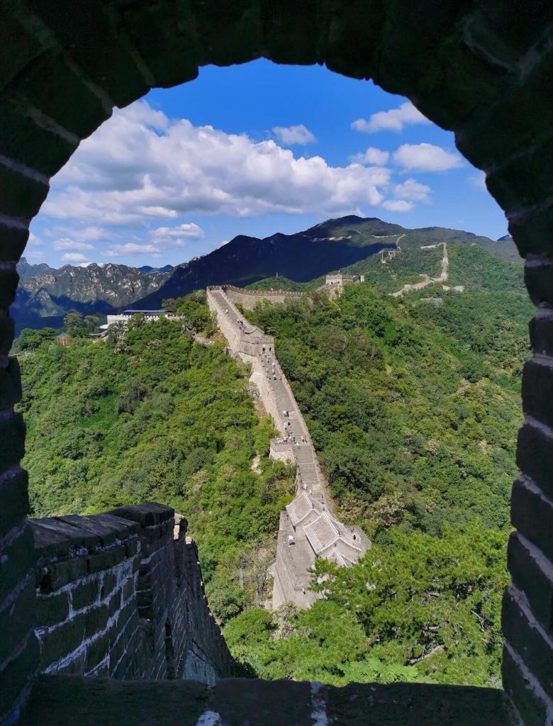Great Wall in May seen through a watchtower arch