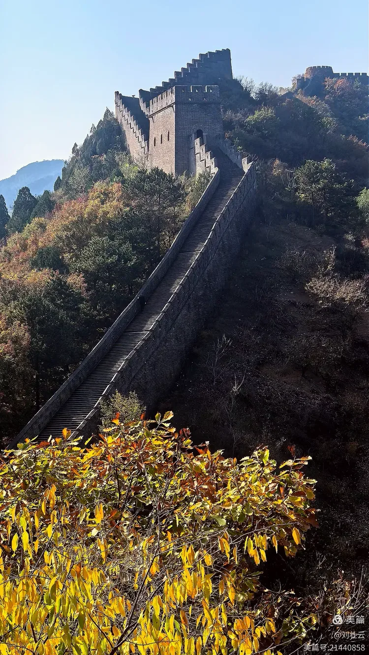 Steep Huangyaguan Great Wall steps below a tower