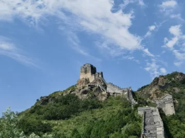 Jiaoshan Great Wall rising above mountain ridges