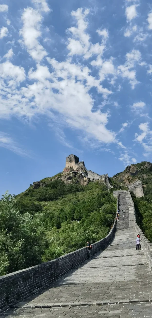 Jiaoshan Great Wall rising above mountain ridges