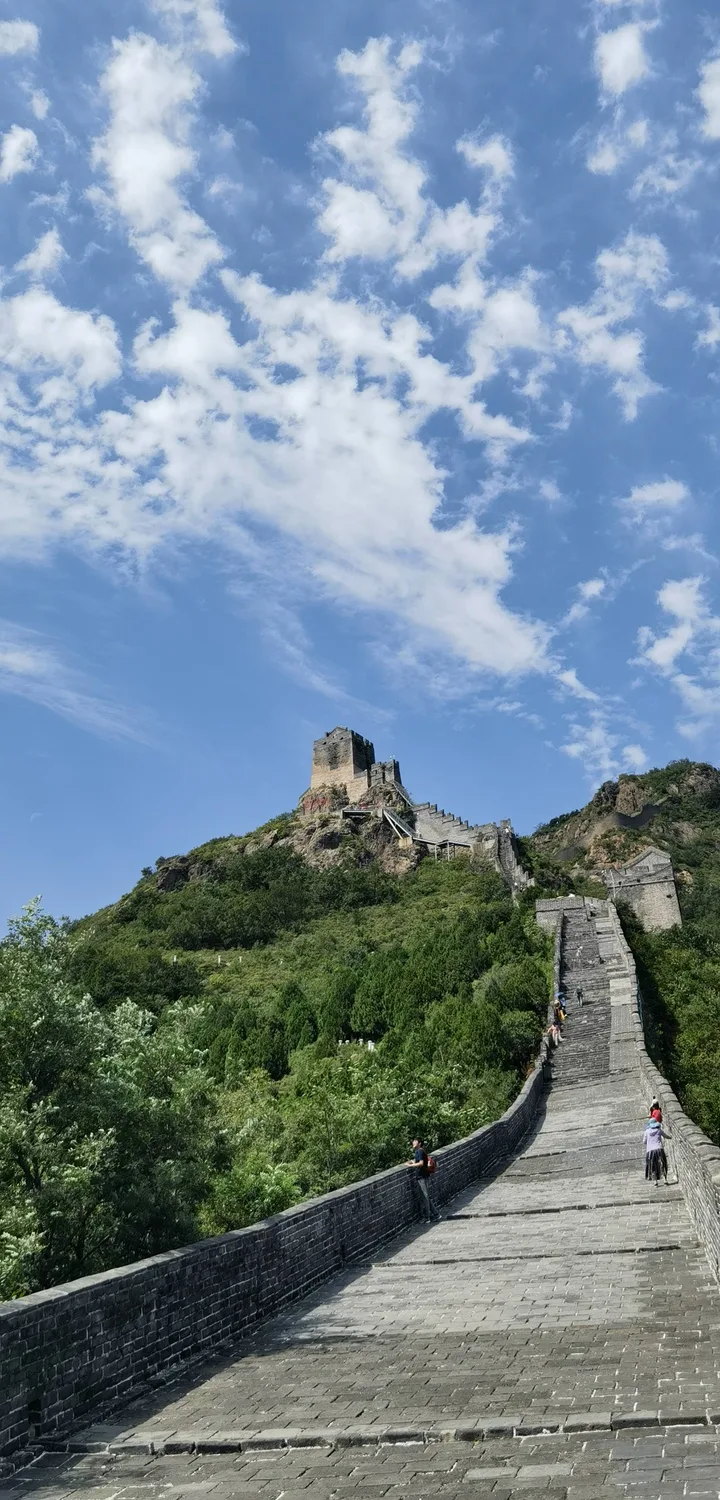 Jiaoshan Great Wall rising above mountain ridges