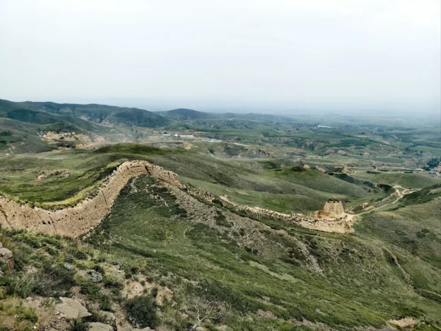 Jin Great Wall remains stretching over low hills