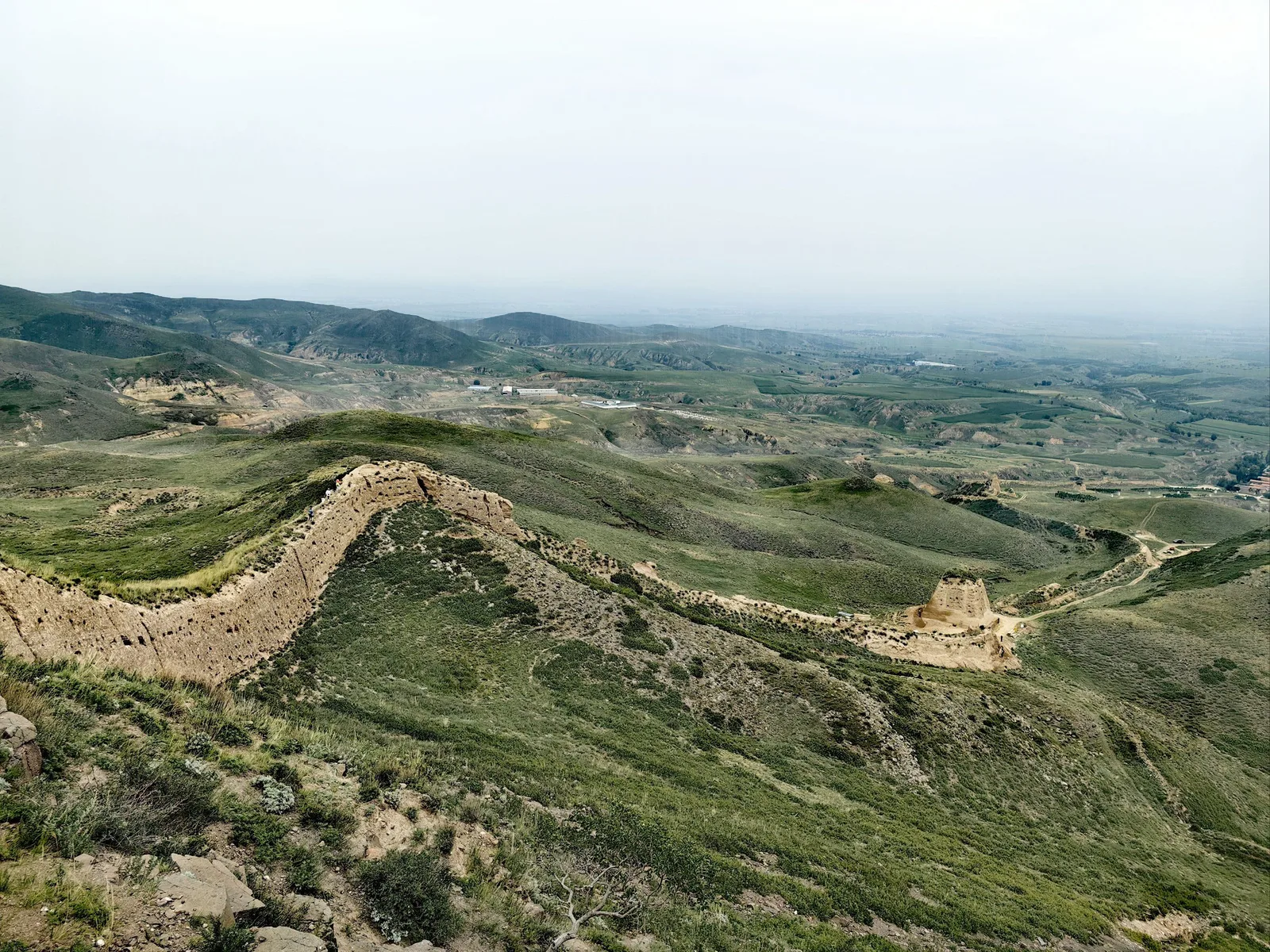 Jin Great Wall remains stretching over low hills
