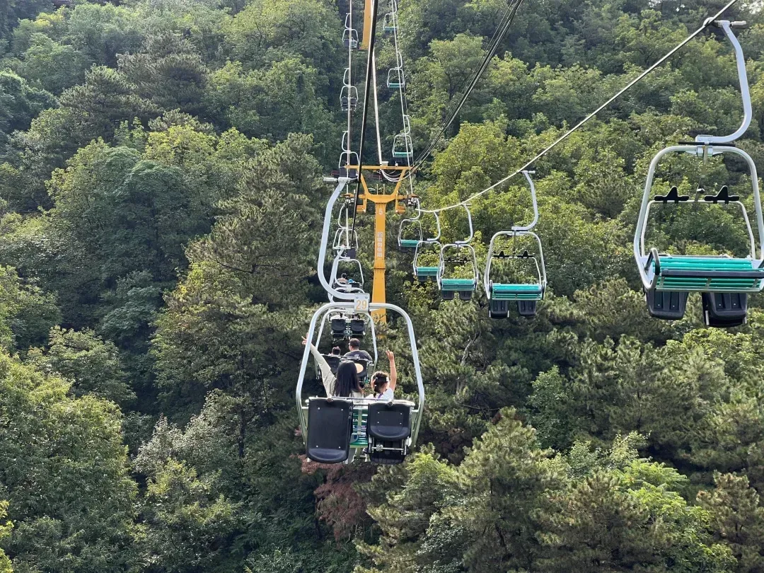 Mutianyu Great Wall open chairlift above forest