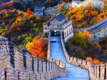 Mutianyu Great Wall watchtower and restored wall above the mountains