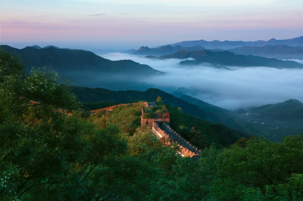 Cloud sea and green mountains near Mutianyu Great Wall after summer rain