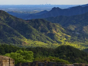 Green Mutianyu Great Wall ridge in July summer conditions