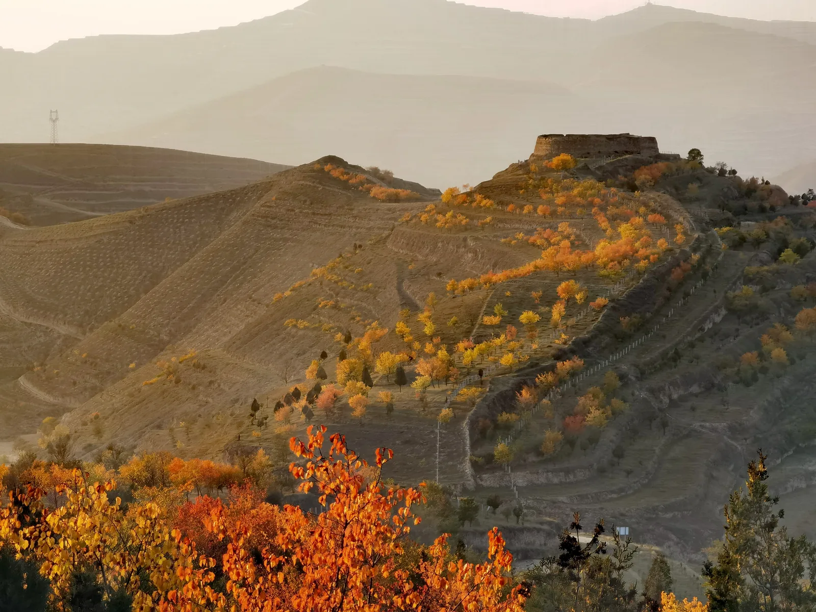Ancient Great Wall ruins on a dry mountain ridge