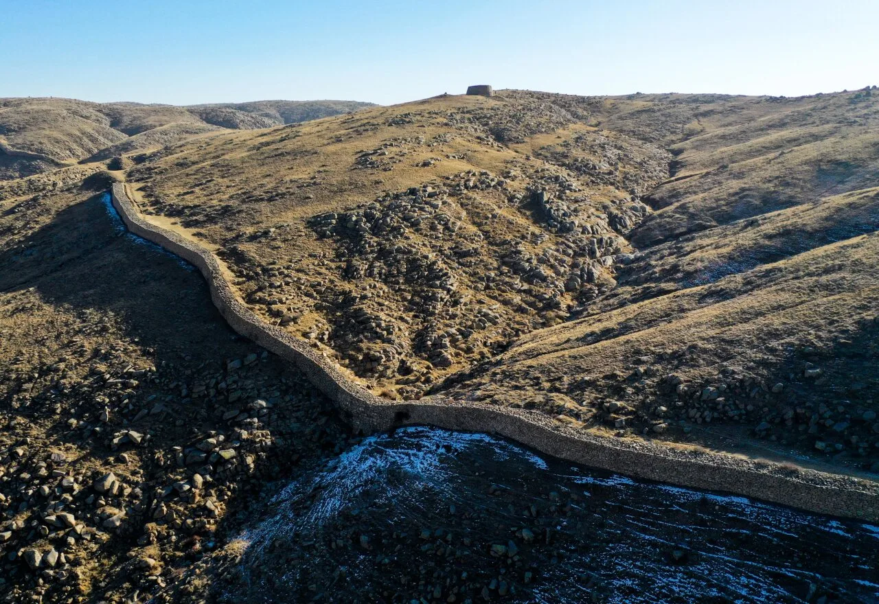 Great Wall remains following a dry mountain ridge
