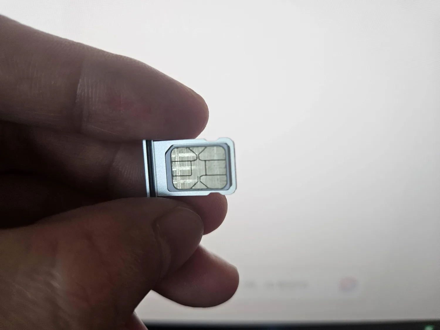 Close view of a SIM card for travel phone setup