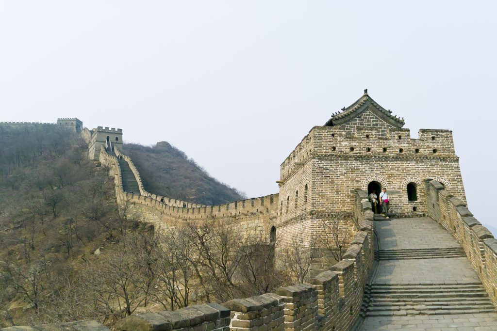 Visitors walking along a restored section of Mutianyu Great Wall