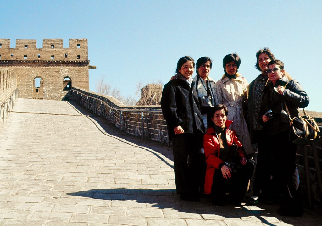 Visitors posing together during a Great Wall visit