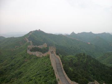 Jinshanling Great Wall winding along forested mountain ridges