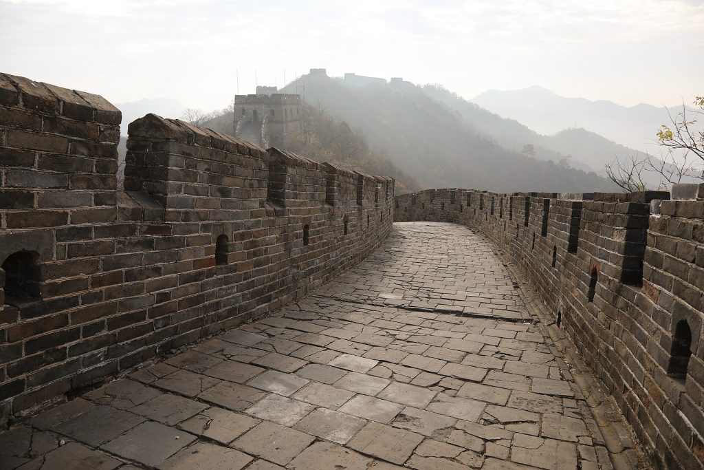 Stone walkway along Mutianyu Great Wall with mountain views