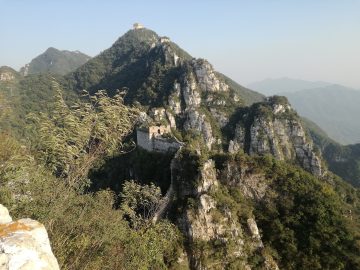 Unrestored Jiankou Great Wall on a steep mountain ridge