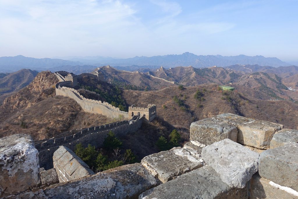 A wide mountain view from Jinshanling Great Wall with watchtowers and stone walls