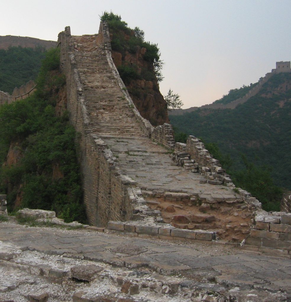A steep stone staircase leading toward a watchtower at Jinshanling Great Wall