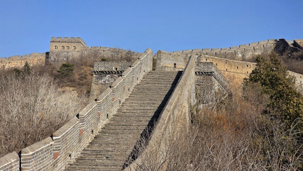 Long restored stairway climbing toward watchtowers at Jinshanling Great Wall