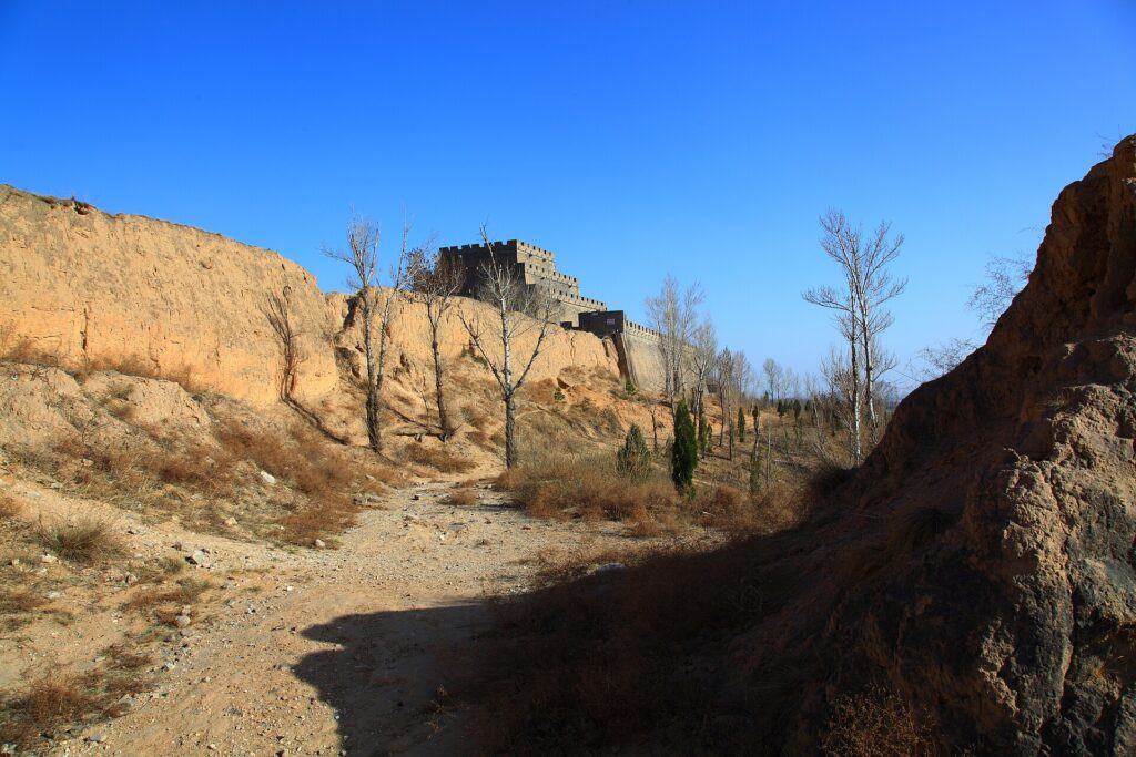 Weathered earthen remains and brick fortification in the Zhenbeitai landscape